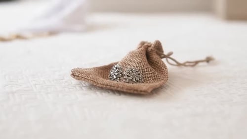 Diamond Earrings in Burlap Bag Close Up