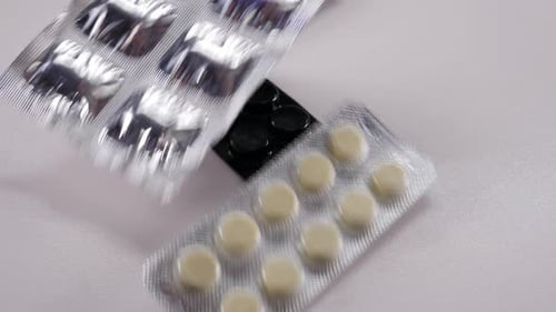 Assorted Colorful Blister Packs of Pills and Capsules