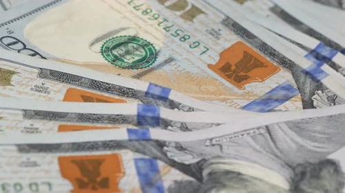 Close Up Shot of Stacked Hundred Dollar Bills