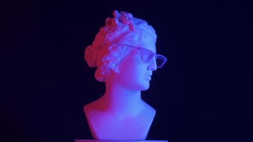 Closeup Shot Ancient Marble Bust Statue of Roman Era Woman in Glasses Spinning Round on a Platform
