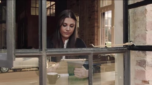 Woman Browsing The Internet Or Online Shopping In Cafe. Steadicam Shot