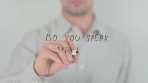 Writing Do You Speak Spanish On Glass