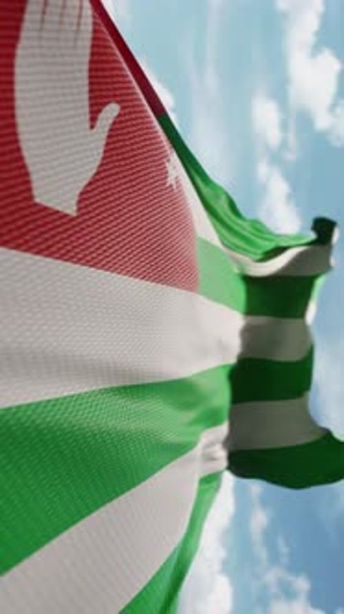 La bandera ondulada de Abjasia ondea con el viento en cámara lenta y ondea el símbolo oficial del equipo de bandera abjasia
