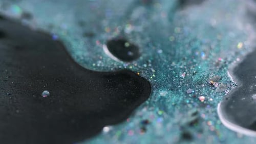 Macro Abstract Shot of Teal and Black Fluid