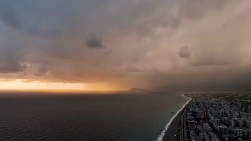 Coastal City Skyline at Dramatic Sunrise or Sunset