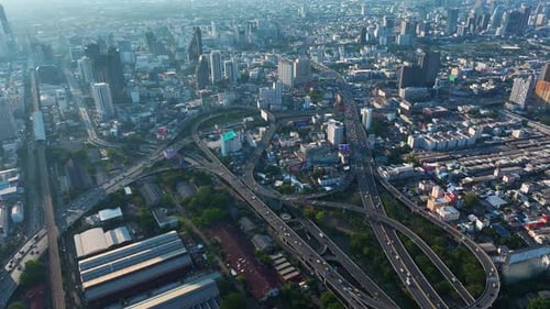 Explore the vibrant urban landscape of a bustling city as day turns to night
