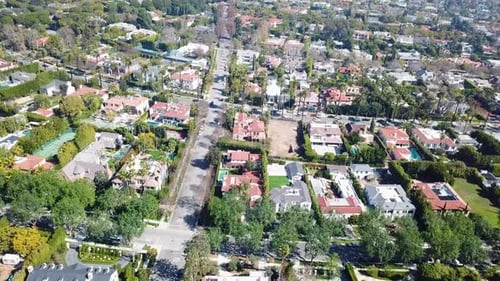 Upper class neighborhood with villas and Swimming pool in Beverly Hills Town, California. Sunny summ