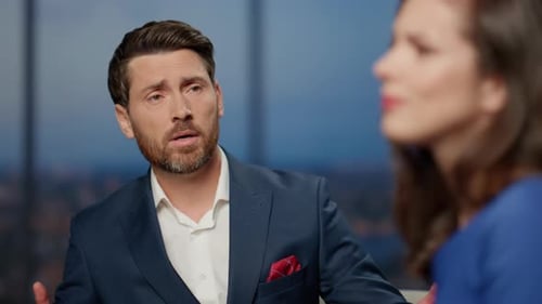 Sad Talk Show Guest Discussing Life Problem with Presenter in Studio Close Up