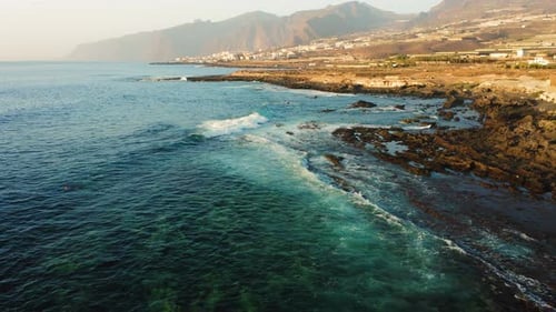 Aerial Footage of Rocky Volcanic Coastline Tenerife Canary Islands Spain Europe