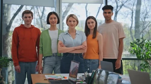 Diverse Team Smiling in a Modern Office