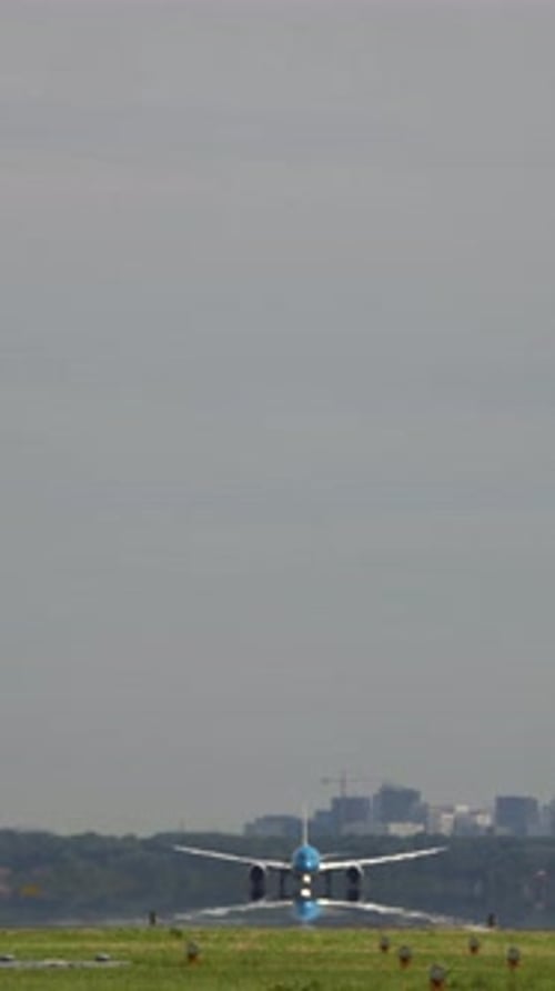 Wide Body Airplane Taking Off From Runway