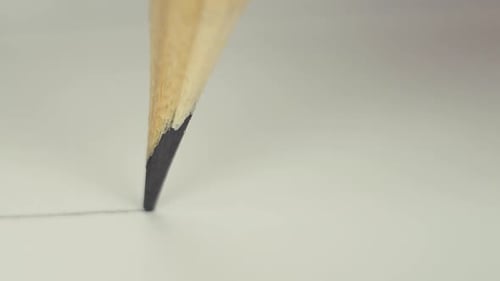 Close Up of a Pencil Drawing a Line