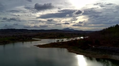 Aerial view of the natural lake between islands and hills