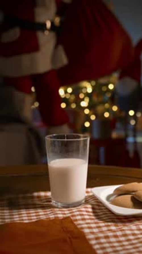 Santa Claus Bringing Gifts Eating Ginger Cookies with Milk