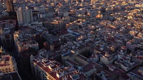 Architecture of Barcelona with Sagrada Familia in background. Aerial
