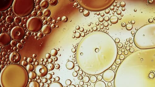 Golden Droplets and Bubbles in Liquid Macro Shot