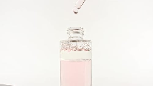Cosmetic Bottle with Pipette on White Background Cosmetic Spa Medical Skin Care Advertising of a