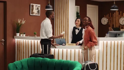 Hotel Staff Assisting Weary Tourists