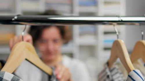 Choosing Clothing From Wardrobe Close Up