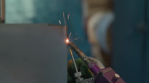 Close up welding work connecting construction materials