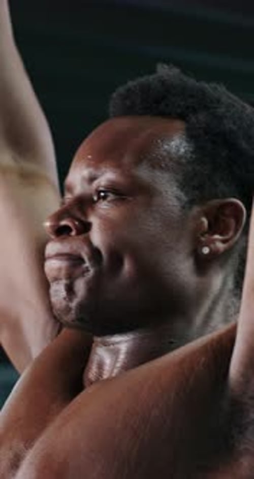 Fitness, barbell and black man in gym, bodybuilder and wellness with challenge, strong and sweating