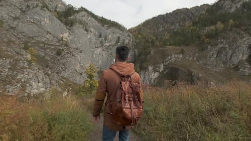 Hiker Tourist Traveler Man with Backpack at Mountains Outdoors River Hiking Travel Landscape Nature