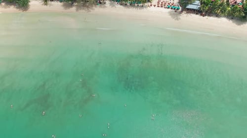 Coastal Resort and Turquoise Ocean Meeting Sandy Beach