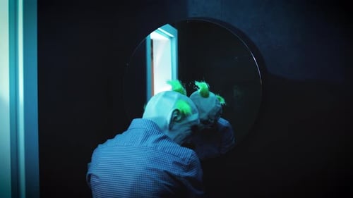 Crazy Man with Clown Mask Prepare for Night Out