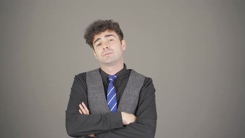 Young Adult Man Stretching Neck in Formal Wear