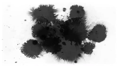 Abstract Black Ink Spreads on White Surface