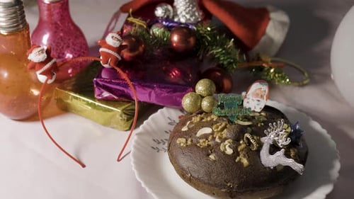 Christmas Still Life with Pudding Cake and Gifts