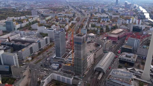 Aerial View of Berlin's Alexanderplatz Featuring Modern Skyscrapers Under Construction Bustling