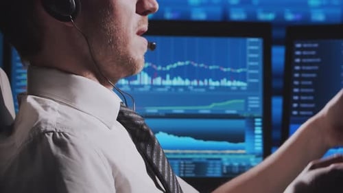 Trader Works in Office Using Workstation and Analysis Technology Workplace of Professional Crypto