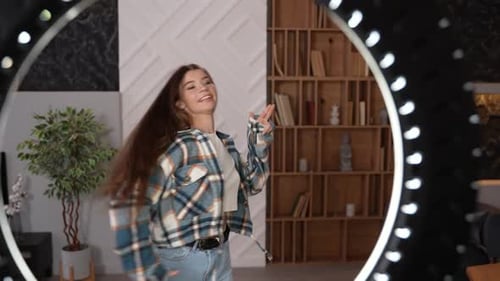 Cheerful Woman Dancing in Living Room for Mobile Video
