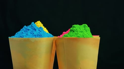 Brightly Colored Powders Piled in Wooden Cups