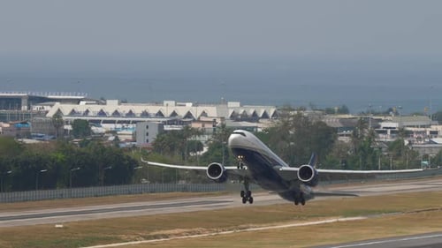 Passenger Jet Taking Off from Airport Runway