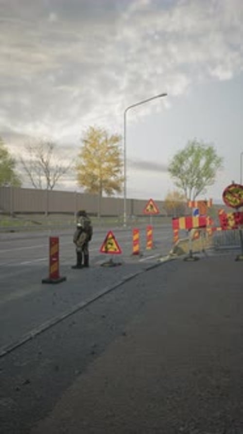 Traffic Management and Road Maintenance in Action By Skilled Worker