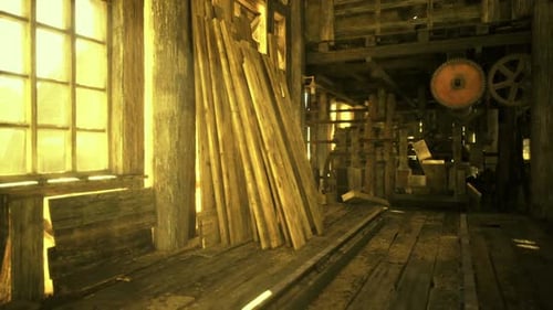 Peaceful Decay in Oncebusy Industrial Interior with Drifting Dust