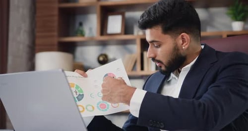 Young Adult Presents Business Data on Video Call