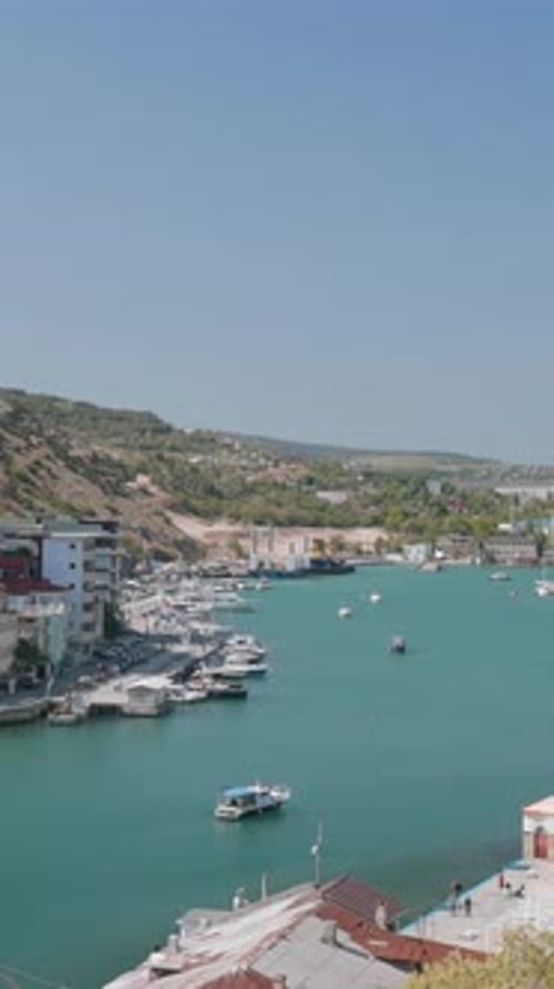 Bay with Beautiful Seaside Town Action Top View of Bay with Beautiful Sea Boats and City on Shore