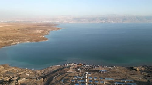 Aerial shot of stormy land in summer, drone flying over landscape - Dead Sea, Israel