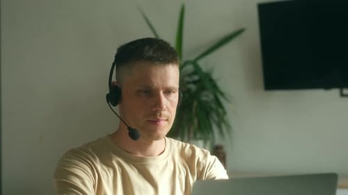 Man Places Microphone Near Mouth for Optimal Sound Clarity