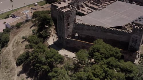 Aerial view over Old Fortress near sea in spain