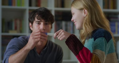 Young Couple Excited by Pregnancy Test Result