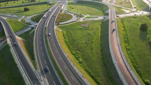 Cars Moving on Transport Road Junction in City Aerial View