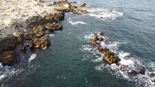Aerial View of Sea Waves and Fantastic Cliffs Rocky Coast