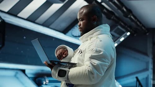 Astronaut Crew Inside Futuristic Spacecraft Monitoring Mission Data on Laptop