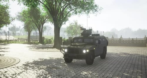 Military Vehicle Parked in a Serene Park During a Bright Sunny Day