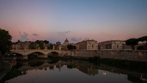 Rome Skyline with the Vatican St Peter Basilica and St Angelo Bridge at sunrise