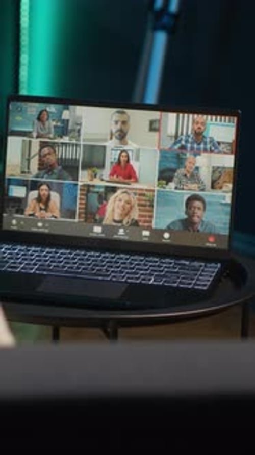 Diverse Team Videoconference on Laptop Display